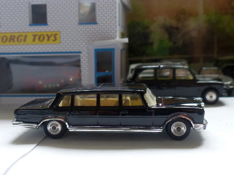 Remote - Controlled High - Speed Off - Road Buggy with All - Terrain Tires and Suspension247 Mercedes-Benz 600 Pullman in black (rebuilt)